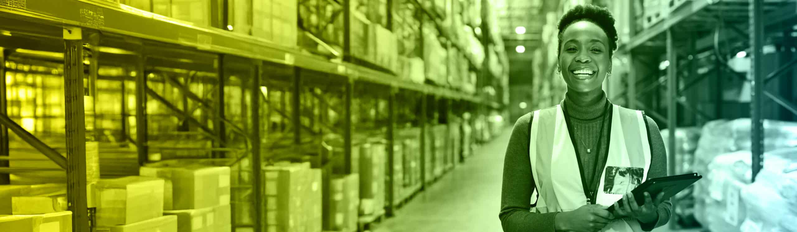 Woman in a high vis jacket in a warehouse