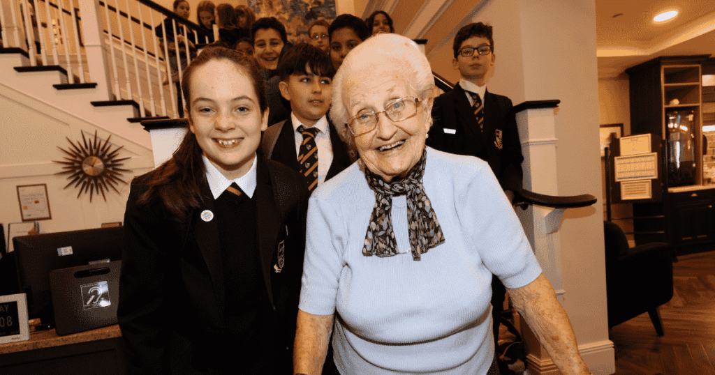 a group of school students visit a care home as part of their work experience. | STEP Surrey | Build your talent pipeline |